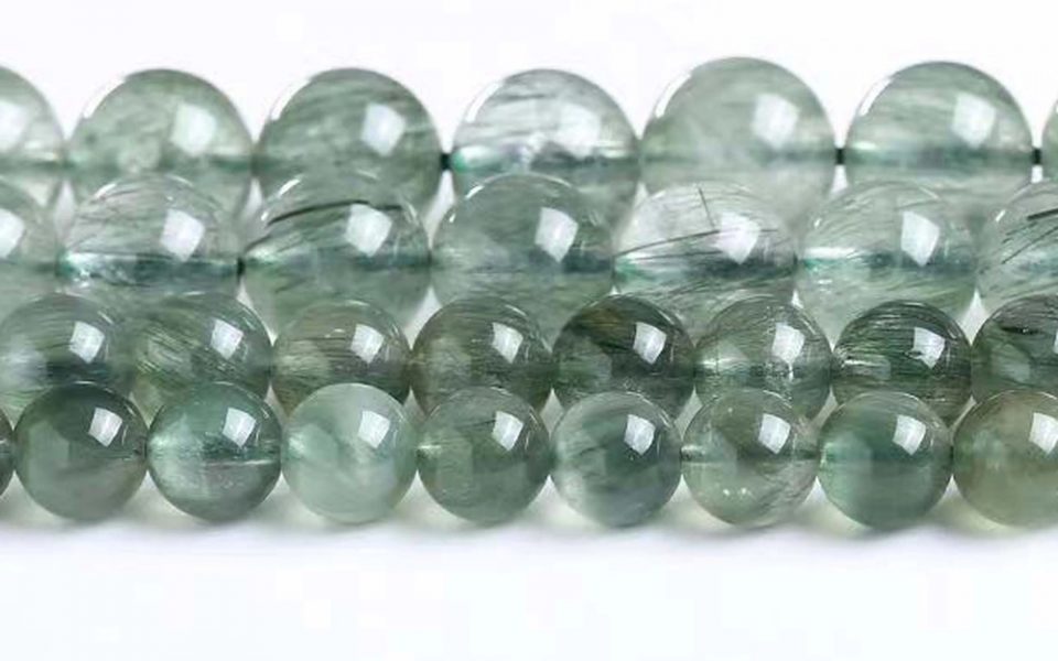 Đá thạch anh tóc xanh (Green Rutilated Quartz)